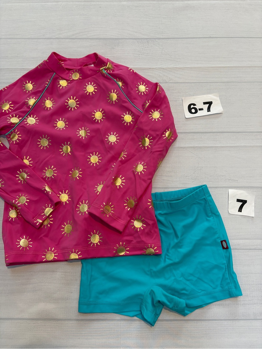 Mini Boden Pink Rashguard with Gold Sun Print & Teal Swim Shorts
